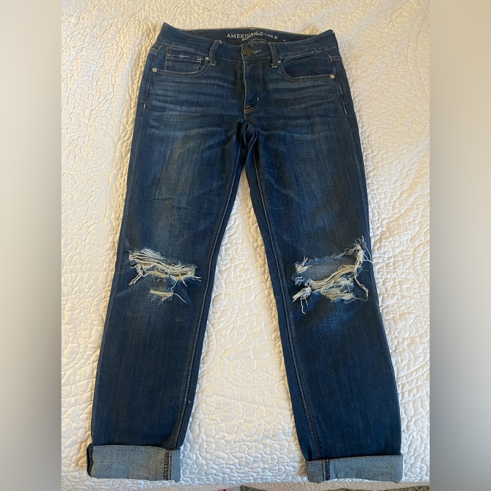American Eagle Size 2 Women’s dark wash, button fly distressed “girlfriend” jean